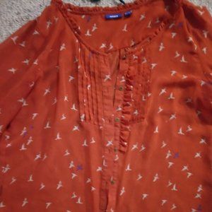 Red blouse with birds